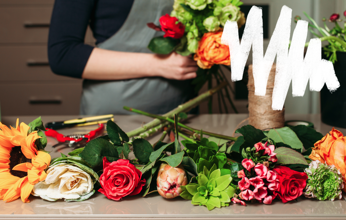 florist assembling a bouquet of pet-safe flowers